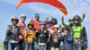 <center>Baptême de parapente : Les marmailles de<br> 1000 Sourires s’envolent en compagnie d’Abdoul