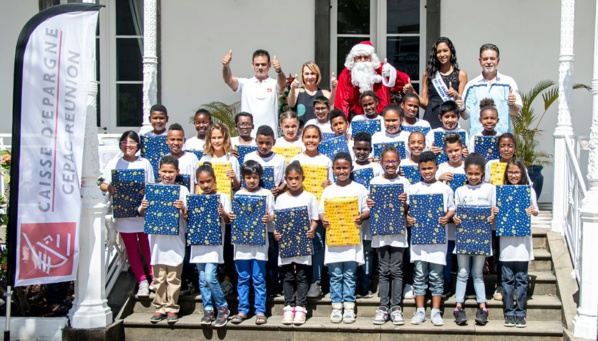 <center>Le Père Noël se met en trois <br> pour gâter les marmailles de 1000 Sourires