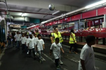 <center>Les marmailles de 1000 Sourires <br> dans les coulisses de l’aéroport Roland Garros