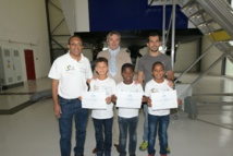 <center>Jour 9 : "S'envoler vers le Rêve ..." <br>Les neuf marmailles ont testé un simulateur <br> exceptionnel de pilotage d’hélicoptère à Albertville <center>Jour 9 : "S'envoler vers le Rêve ..." <br>Les neuf marmailles ont testé un simulateur <br> exceptionnel de pilotage d’hélicoptère à Albertville