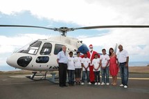 Les V.I.M. de  1000 Sourires fêtent Noël à bord  d’un hélicoptère