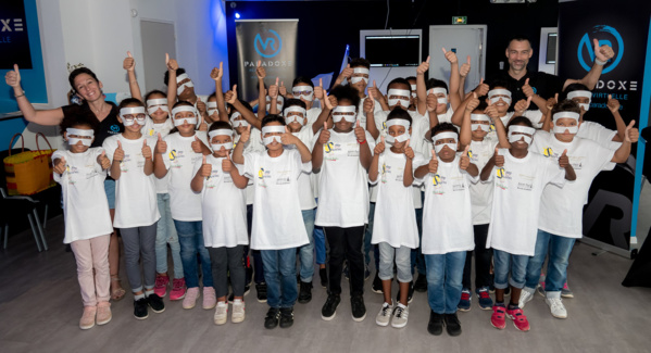 <center>Les marmailles de 1000 Sourires transportés dans une réalité virtuelle par VR Paradoxe. <center>Les marmailles de 1000 Sourires transportés dans une réalité virtuelle par VR Paradoxe.