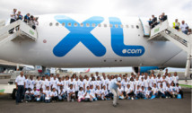 <center>85 marmailles de 1000 Sourires <br> touchent le ciel avec XL Airways                                                                    