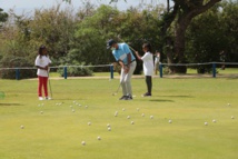 <center>Golf du Bassin Bleu :<br> les marmailles de 1000 Sourires<br> tapent la balle avec des champions réunionnais