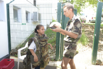 Un Noël citoyen à la Base Aérienne 181 pour les marmailles du quartier de Barrage Un Noël citoyen à la Base Aérienne 181 pour les marmailles du quartier de Barrage