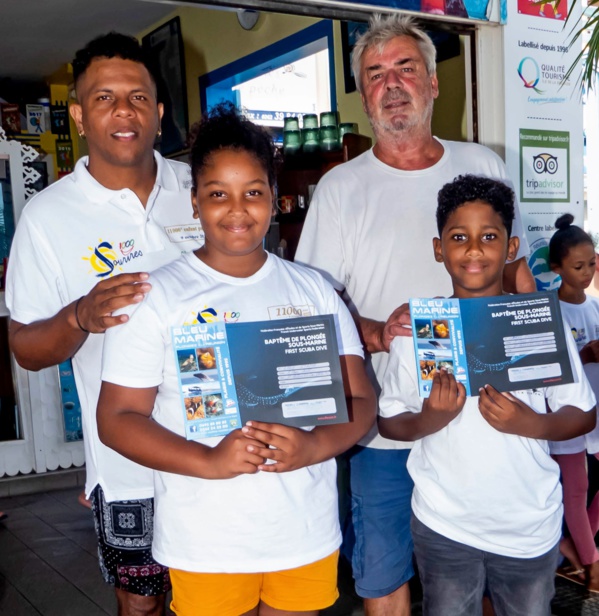 <center>Baptême de plongée : <br>les marmailles de 1000 Sourires comme <br> des poissons dans l’eau avec Titi le Comik <center>Baptême de plongée : <br>les marmailles de 1000 Sourires comme <br> des poissons dans l’eau avec Titi le Comik