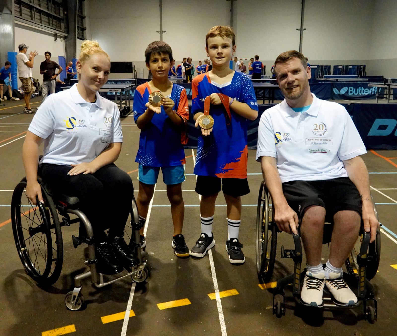 <center>Para tennis de table :  Florian Merrien et <br>Flora Vautier avec les pongistes du SPORTT de Saint-Paul